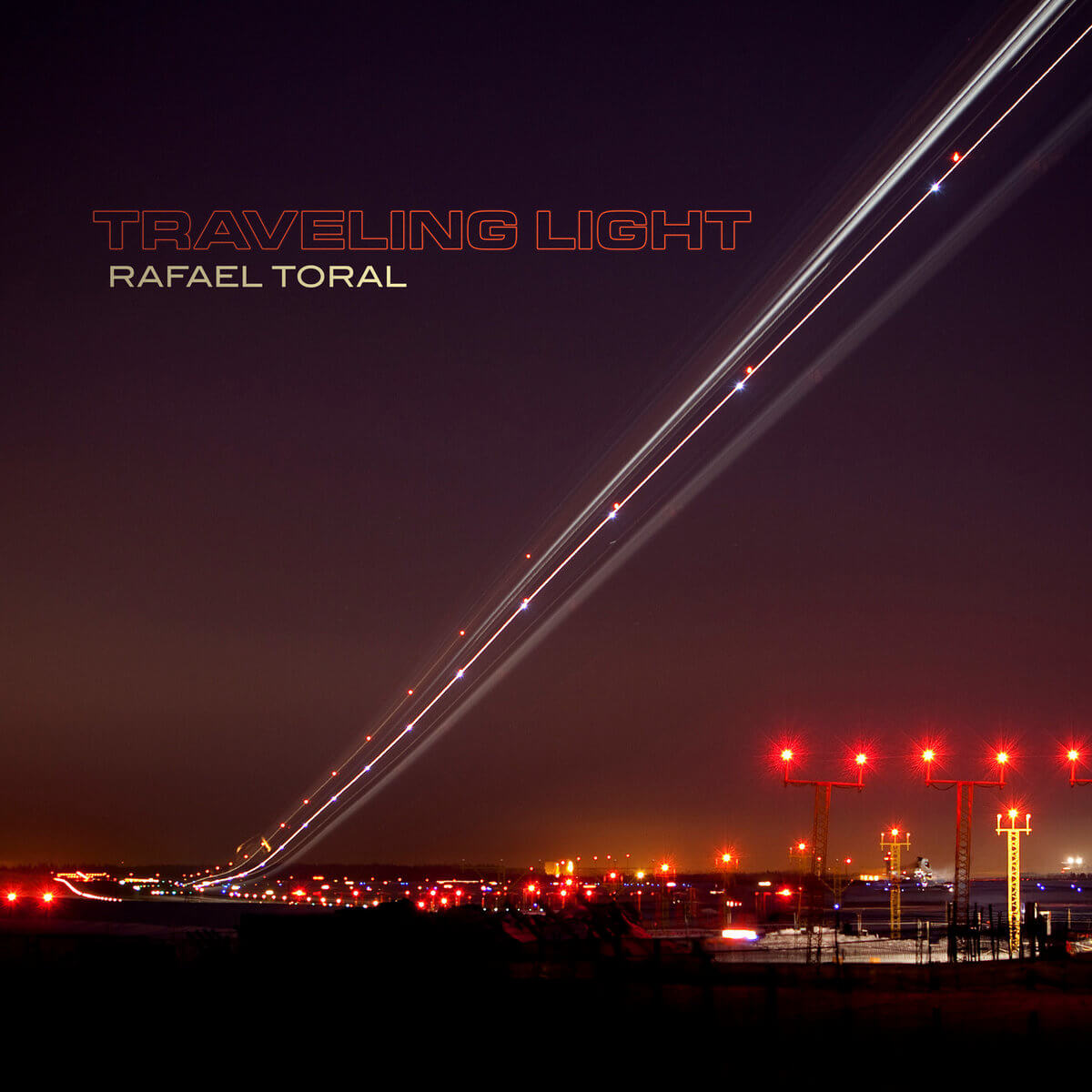 TRAVELING LIGHT - RAFAEL TORAL